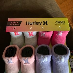 HURLEY baby booties, 4 pairs new.